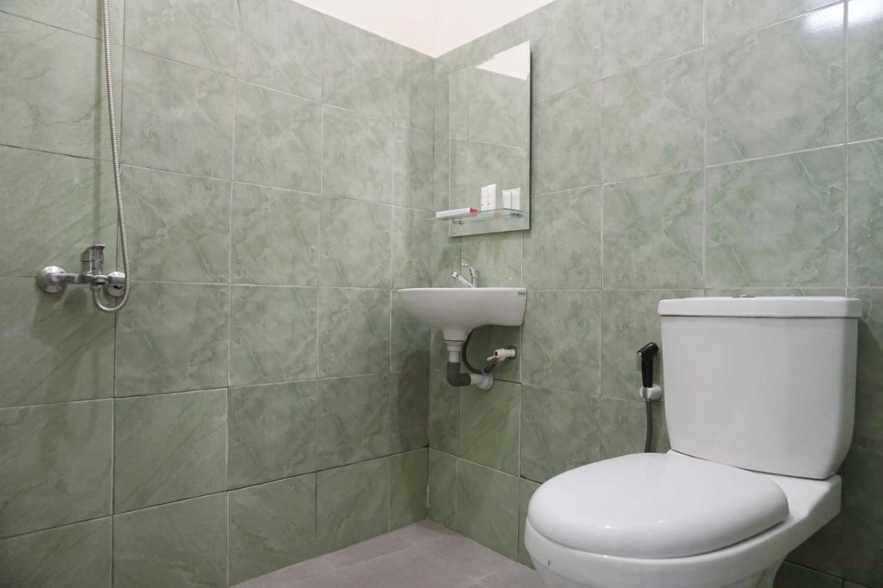 פקאנבארו Oyo 1394 Rumaisa Homestay Syariah מראה חיצוני תמונה